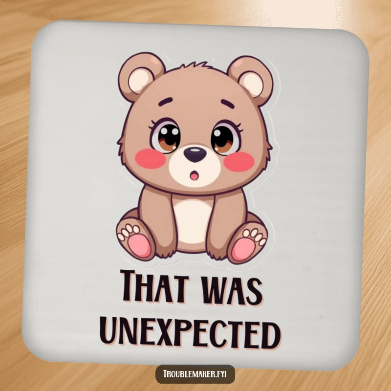 Funny Drink Coaster showing a bear cub with comical wide eyes, looking surprised by a drink, serving as a humorous reminder to use coasters.