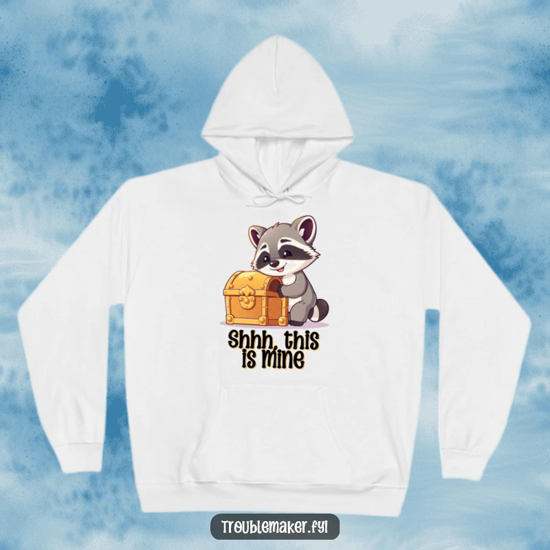 Funny raccoon hoodie featuring a cheeky raccoon picking a treasure chest lock, perfect for cozying up with adventurous dreams.