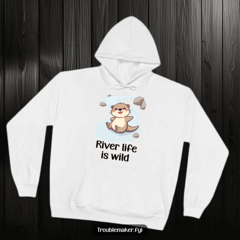 Funny hoodie with a cheerful otter character sliding down a riverbank, offering warmth and a splash of fun.