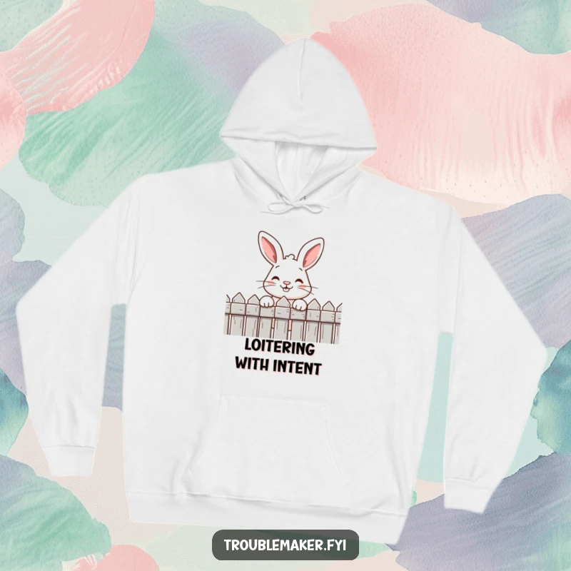 Funny hoodie with a cute rabbit's head and cheeky grin peeking over a fence, offering warmth and playful style.