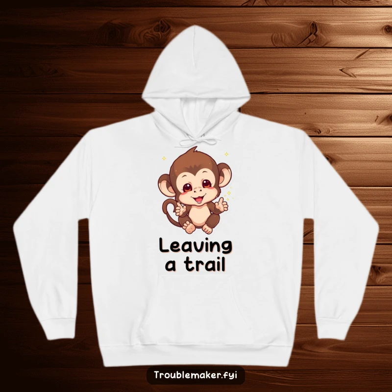 Funny Sparkle Monkey Hoodie of a mischievous monkey with sparkles falling from its hands, radiating magical vibes, awesome funny gift.