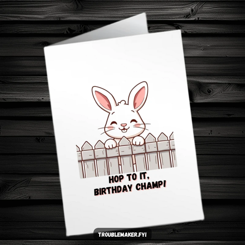 Funny Free Printable Birthday Card: Cheeky rabbit with a mischievous grin peeking over a garden fence, ready to surprise.