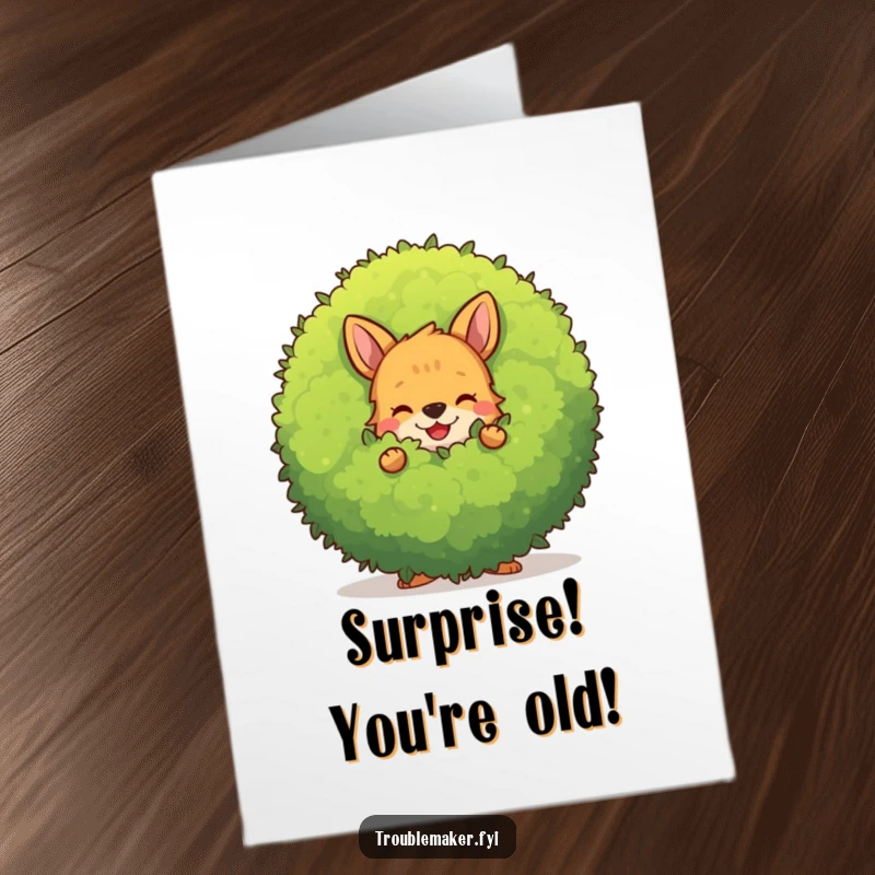 Funny Free Printable Birthday Card: A mischievous animal character secretly hiding behind a large, smiling bush, ready to surprise.