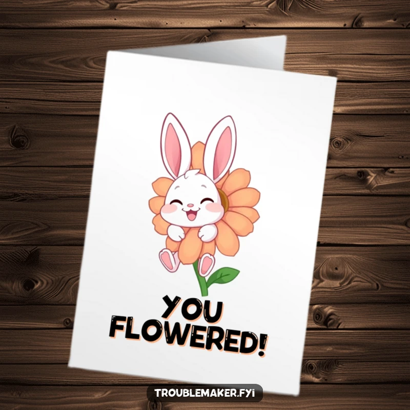Free Printable Congratulations Card: A giggling bunny hiding behind a vibrant flower, conveying a cheerful and unique congratulatory message.