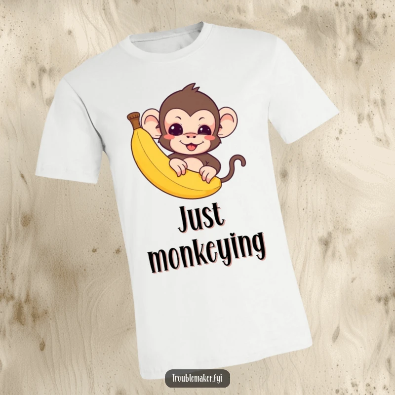 Funny T-Shirt: A cute, mischievous monkey peeks from behind a banana, looking playful.